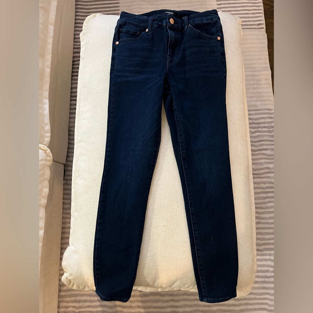 Dark mid rise express jeans 00